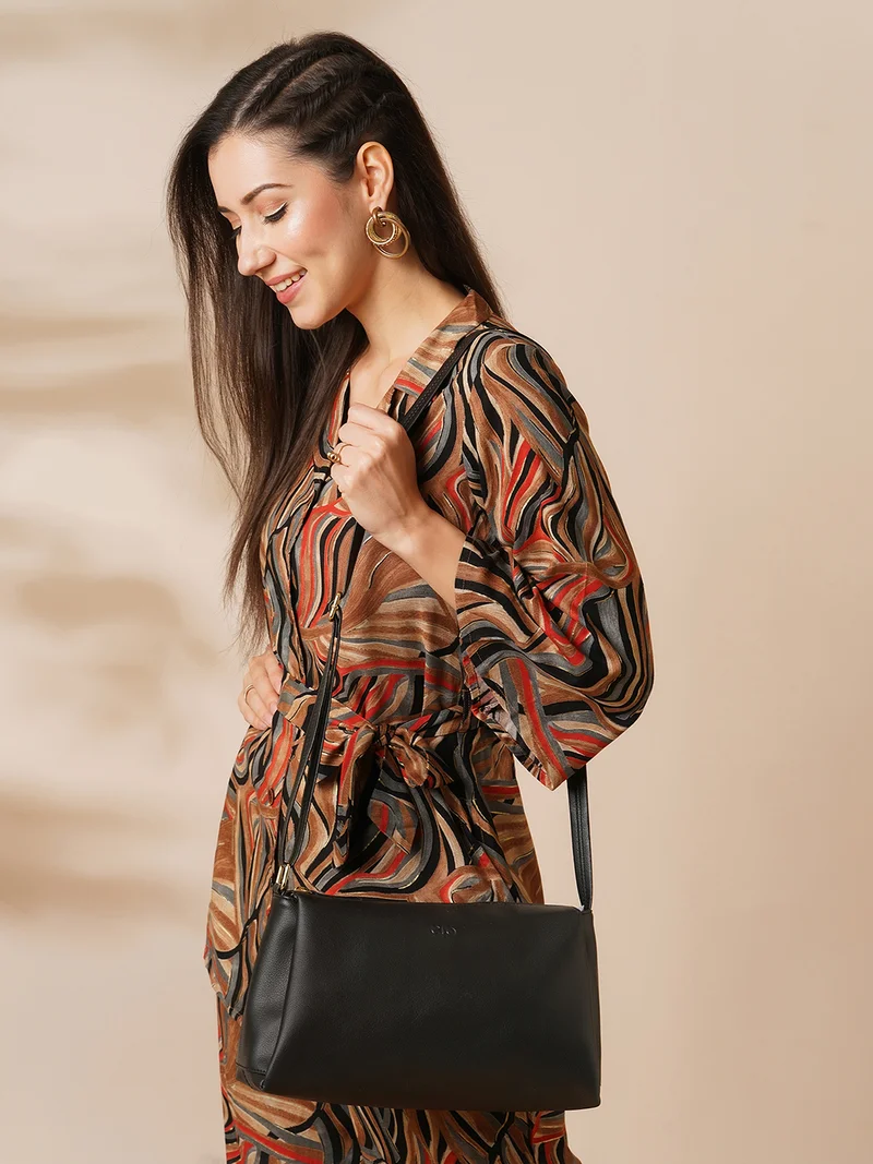 جلو باص Globus Women Black Vegan Leather Textured Rectangular Sling Bag With Adjustable Strap